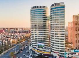 Crystal Orange Hotel Tianjin Jinghai Dongfanghong Road，位于天津的酒店