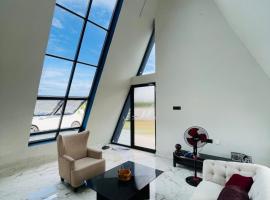 The A-Frame house，位于Kūvattūr的酒店