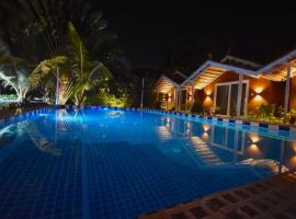Golden Rice Resort & Cottages，位于坎多林的住宿加早餐旅馆