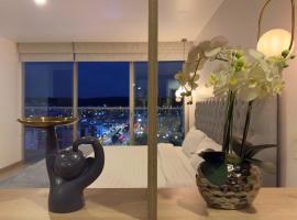 Suite Apartamento Espectacular Vista La Carolina - ONE Quito，位于基多的酒店
