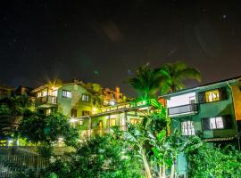 Pousada Vale Verde Bungalows - Praia do Rosa - SC，位于普腊亚罗萨的酒店