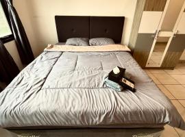 RoomQu at Ecohome Citra Raya，位于Nalagati的酒店