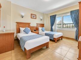 Aura Inn Tiba Pyramids Hotel，位于Giza的酒店