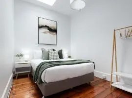 Charming Townhouse Steps Away from Shops