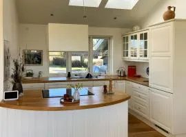 Natural Light And Short Walk To Water In Home