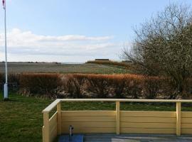 Charming Wooden Cottage Close To Handbjerg Beach，位于温讷鲁普的酒店