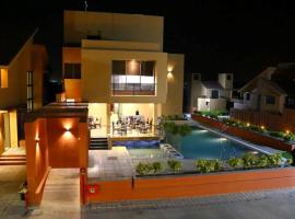 Palette The Royal Castle Resort Rajkot，位于拉杰果德的酒店