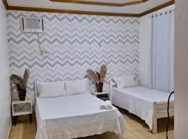 Quarto triplo com banheiro em Pousada e Restaurante