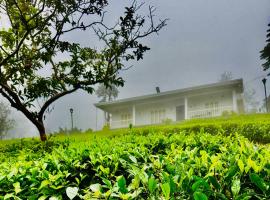 Four Winds Plantation Homestay Approved by Dept of Tourism Govt of Kerala，位于Vandiperiyār的酒店