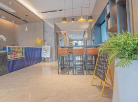 Echarm Hotel Zigong Machishui Wanda Plaza，位于Shuping的酒店