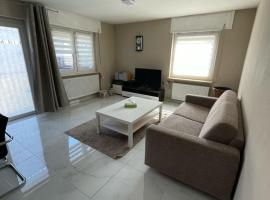 2 Zimmer Holiday Apartment in Karben mit Privatparkplatz-self Check in-15min bis Frankfurt-25min bis Flughafen，位于卡尔本的酒店