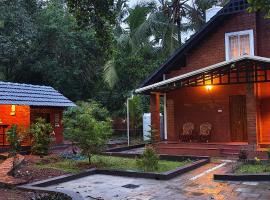 Gangadharam Tiny House，位于Tellicherry的酒店