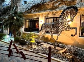 La glycine hotel, spa et bien-être，位于贝努维尔的酒店