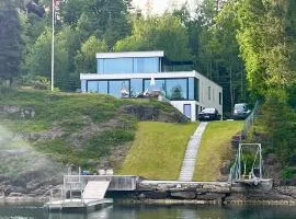 Beachfront apartment with private swimming dock