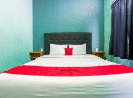 RedDoorz at Sentosa Jaya Helvetia，位于Pulauberayan的酒店