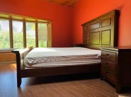 Spacious and bright bedroom with separate bathroom