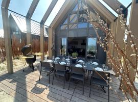 Beach villa at the IJsselmeer 8p，位于恩克赫伊曾的酒店
