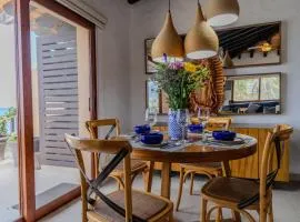 Los Tules 501 one bedroom apartment with ocean views and lush palm gardens