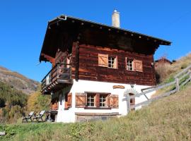 Chalet Le Recoulet 8 personnes - Evolene，位于埃沃莱讷的酒店