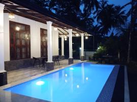 Serene Bliss Villa，位于乌纳瓦图纳的酒店