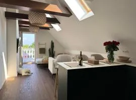 Apartamentai ant marių kranto