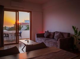 Bright sea view suite with sunset & pool Paphos，位于基索内加的酒店