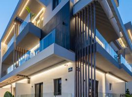 Unicos City Suites，位于科斯镇的带停车场的酒店