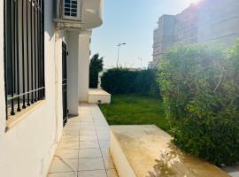 Résidence de standing , appartement à 2 pas de la mer , jardin, piscine Hammamet nord，位于纳布勒的酒店