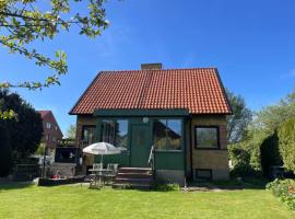 Charmig 50s bungalow med frodig privat trädgård