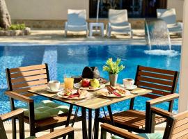 Akhdar Apartments，位于尤塔哈的带停车场的酒店