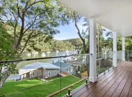 Waterside Retreat with Hillside House and Boathouse in Church Point