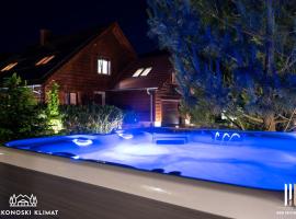 Karkonoski Klimat - apartamenty z sauną, balią i jacuzzi，位于米尔科的酒店