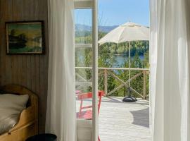 Traditional 60S Cabin By Langåsdammen Lake，位于莱旺厄尔的酒店