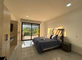 Casa con Terraza y Vista Espectacular a la Naturaleza，位于多斯克布拉达斯的酒店