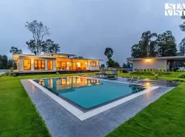 StayVista at Serenova with Pool, Bar