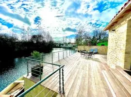 Marais Poitevin maison au bord de l'eau