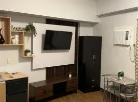 Cozy condo unit at Amani Grand near Cebu Airport