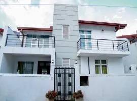 Rose Villa-AC 3 Bed rooms,15 mins to airport with gated community & swimming pool