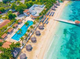 Chic 2BDR Oceanview Escape, Pool & Beach Access，位于迪斯卡弗里贝的酒店