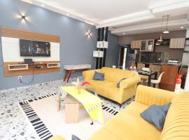 AfriqPnB RF Appart 3-chambres avec Piscine，位于Bébamboué的酒店