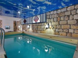 אצולת אבן חן - ראש פינה，位于罗什平纳的酒店