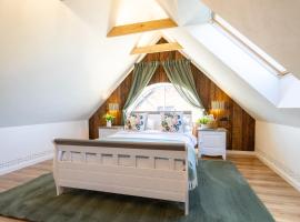 Raxti，位于库尔迪加的酒店