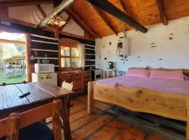 cabaña de sierras- tronco piedra