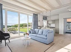 GUT KLETKAMP "Mühlenhof 5" - Ruhige Ferienwohnung mit 3 Schlafzimmern I Terrasse mit See- & Naturblick I Gemeinschaftsgarten I 15 Min zur Ostsee I Küche I Parkplatz I Waschmaschine I WLAN