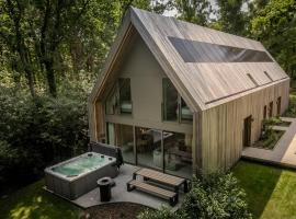 Lodge met Jacuzzi - 8 personen - Woodz Lodges，位于赫斯登-佐尔德尔的酒店
