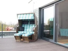 Auszeit im Sielhuus - Familienfreundliche Ferienwohnung mit Dachterrasse und Sauna