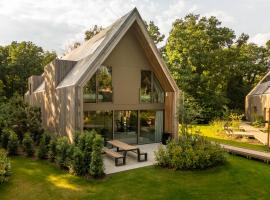 Lodge - 8 personen - Woodz Lodges，位于赫斯登-佐尔德尔的酒店