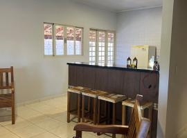 Casa das Orquídeas Delfinopolis MG，位于德尔菲诺波利斯的酒店