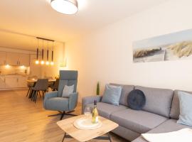 Ferienwohnung Hyggelig - Strandnah mit Sauna und Balkon，位于多鲁姆的酒店