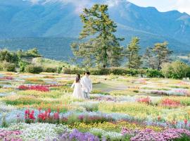 くじゅう花公園　キャンピングリゾート花と星，位于Kuju的豪华帐篷